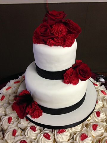2 tier white fondant with red roses