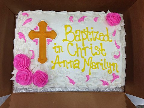 baptism pink roses with gold cross