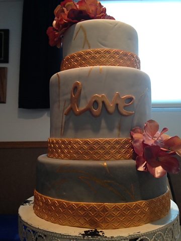 3 tier grey and white marble with gold fondant